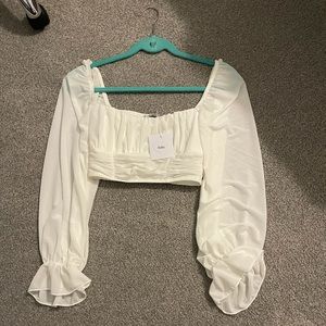 Adika tags on silky cropped puff sleeve shirt